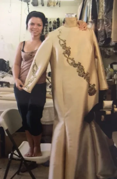Anna Ostrovskiy working in New York City garment district sewing and fashion design